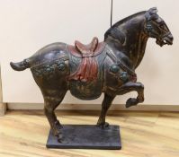 A Chinese carved and painted wood horse, 56cm tall