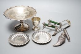 A George V silver tazze, diameter 14.7cm, two small sterling nut dishes, a late Victorian fluted