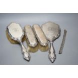 A George V silver five piece dressing table set, by Charles & Richard Comyns, London, 1917, (comb