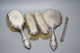 A George V silver five piece dressing table set, by Charles & Richard Comyns, London, 1917, (comb