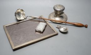 A silver mounted rectangular photograph frame, a modern silver mounted toddy ladle, a silver vesta