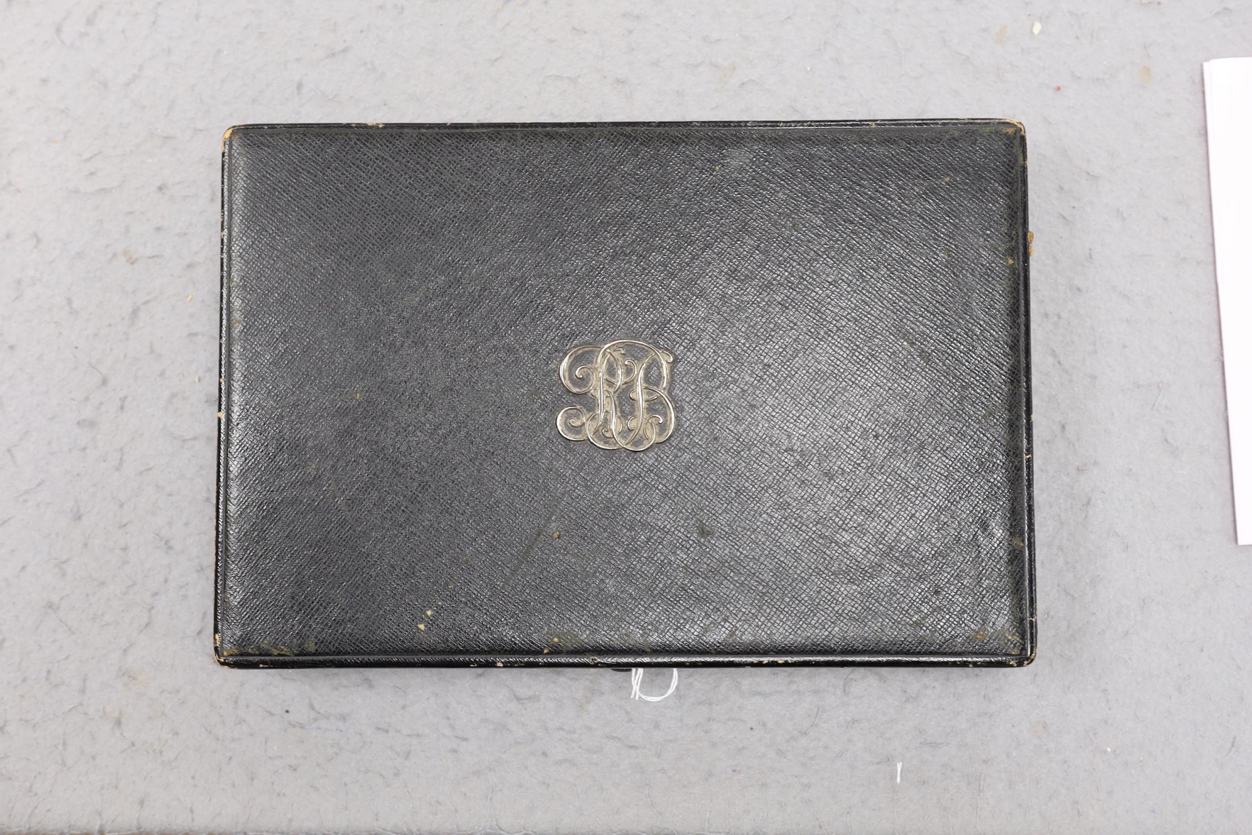 An Asprey & Co. Morocco leather jewellery box, with applied white metal monogram, 33.2cm width