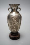 A late 19th/early 20th century Chinese Export white metal two handled vase, decorated with bamboo,