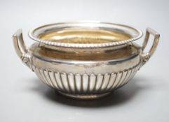 A George III demi fluted silver two handled sugar bowl, Burwash & Sibley, London, 1811, 16.8cm
