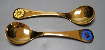 A Georg Jensen gilt sterling 1972 'Cornflower' spoon, 14.9cm and a similar Georg Jensen 1973