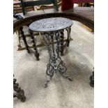 A Victorian style cast iron circular table, diameter 36cm, height 72cm