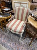 A Louis XVI style upholstered painted fauteuil, width 68cm, depth 60cm, height 107cm