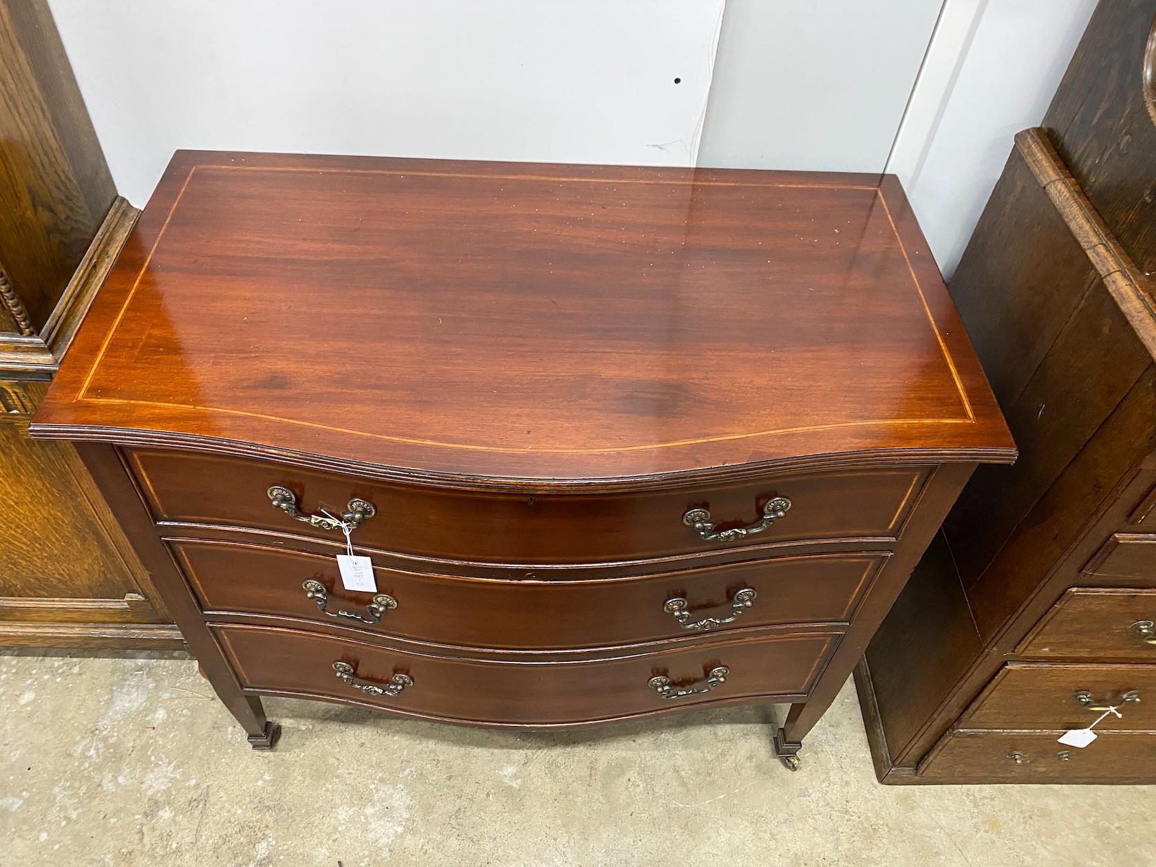 An Edwardian satinwood banded serpentine front inlaid mahogany three drawer chest, width 91cm, depth - Image 2 of 2