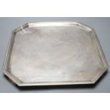 A George V silver square salver with canted corners, on straight feet, Thomas Bradbury & Sons,