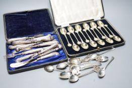 A cased set of twelve Victorian silver gilt teaspoons, London, 1894, six pairs of Edwardian silver