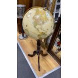 A Replogle 16inch terrestrial globe on tripod stand height 97cm.