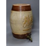 A 19th century salt glazed stoneware Brandy barrel, with Royal coat of arms sprigging, 33cm