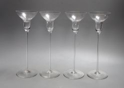 A set of four Riedel glass candlesticks, boxed