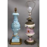 A Victorian brass mounted bone china table lamp and another