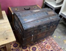 A Victorian wood and iron bound domed trunk, width 78cm, height 54cm, together with a smaller