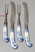 Two pairs of Bow blue and white pistol grip steel carving knives and forks, c.1755, longest night of