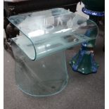 A contemporary curved glass occasional table, width 50cm, depth 43cm, height 62cm