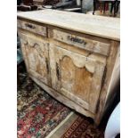 A 19th century French bleached elm buffet, length 129cm, depth 58cm, height 105cm