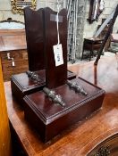 A pair of Gillow style mahogany plate stands, width 27cm, depth 13cm, height 34cm