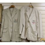Four gentlemen’s cream suits and similar jacket, each bearing Berlin Olympics insignia