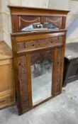 A Spanish inlaid walnut wall mirror, width 80cm height 128cm, and a later Asian carved and pierced