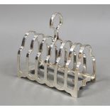 A George V silver seven bar toast rack, George Howson, Sheffield, 1926, length 13cm, 7.7oz.