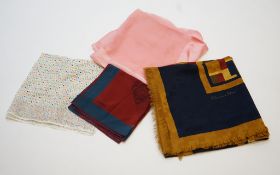 Four assorted scarves; Givenchy cotton, YSL peach chiffon, Christian Dior geometric and Loewe silk