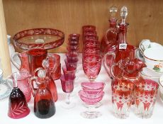 Red glasswares and six various cranberry coloured glass jugs, etc. 19th/early 20th century