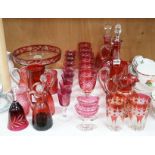 Red glasswares and six various cranberry coloured glass jugs, etc. 19th/early 20th century