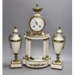 A Louis XVI style white marble and ormolu clock garniture, clock 47cms high