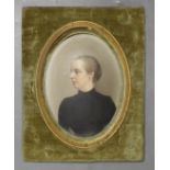 A late 19th century painted porcelain portrait plaque, in felt mount. 18x14cm total