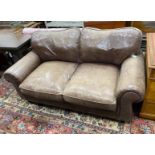 A Laura Ashley brown leather upholstered two seater settee, width 172cm