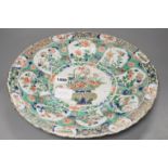 A Chinese Kangxi famille verte dish (repaired), 36cms diameter