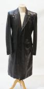 A gentleman's Yves Saint Laurent black leather trenchcoat, size IT 52 (UK 42)