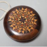 A Tunbridge ware rosewood and half square mosaic yo-yo, c.1830-50, 8cm diameter