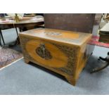 A Chinese carved camphorwood chest, length 104cm, depth 51cm, height 60cm