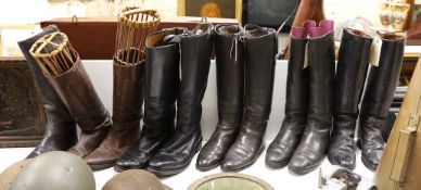 Five pairs of leather Wellington boots, soles vary around 30cm