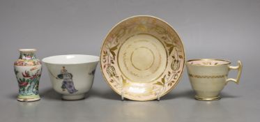 A Chinese famille rose tea bowl, similar small vase and a London shape coffee cup and saucer