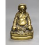 A Chinese bronze of a seated Marpa, 25cms high