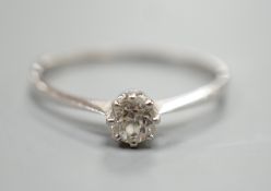 An 18ct and solitaire diamond ring, size U/V, gross weight 2.5 grams.