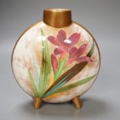 A Doulton style moonflask with painted flower lily decoration. 16cm high