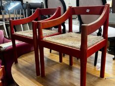 A set of four Magistretti Carimate chairs with rush seats