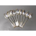 A matched set of nine George III and later Scottish silver dessert spoons, including Edinburgh,