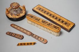 A group of Tunbridge ware to include an inkstand, two paper knives (one a handle only), cribbage