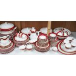 A Royal Worcester Regency pattern red and gilt bordered part dinner service