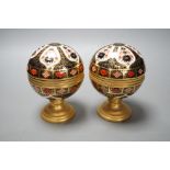 A Royal Crown Derby Millennium globe thermometer and a Millennium globe aneroid barometer, 13cms