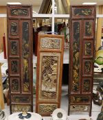 A pair of late 19th century Chinese gilt-decorated lacquer panels and a similar smaller