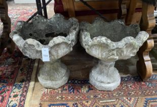 A pair of reconstituted stone garden planters, width 44cm, height 48cm