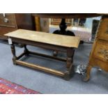 An 18th century style oak stool, length 92cm, depth 30cm, height 46cm