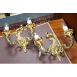 A pair of French ormolu two branch sconces, 27cms high and two other pairs